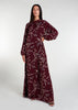 This floral maxi dress in maroon boasts a raised mandarin neck line and subtle pleating for a sophisticated touch. The flowing silhouette can be cinched at the waist, and discreet side pockets offer practicality. Made from lightweight, airy fabric for a comfortable fit.