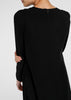 Cut in an A line silhouette with a round neck collar &amp; semi fitted sleeves. Features a concealed zip fastening at the back for easy access. Black