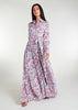 Featuring a vibrant floral pattern with an optional belt for styling, standard collars, discreet side pockets, and buttons all the way down, this maxi dress is perfect for any occasion. It is also suitable for nursing, making it a practical and stylish choice for any mother. Light blue base colour with pink roses and green thorns and leaves.