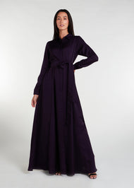 Maximize your style with our Shirted Maxi Aubergine, featuring a timeless fit and flare design, an optional belt suitable for both formal and casual occasions. Purple.