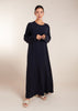 This elegant Two Piece Open Abaya set includes a Full Sleeve matching inner dress. Perfect for everyday wear, it can also be dressed up with accessories for an evening look. The open abaya can be worn as a maxi on its own or paired with the inner dress for a stylish ensemble. In navy.